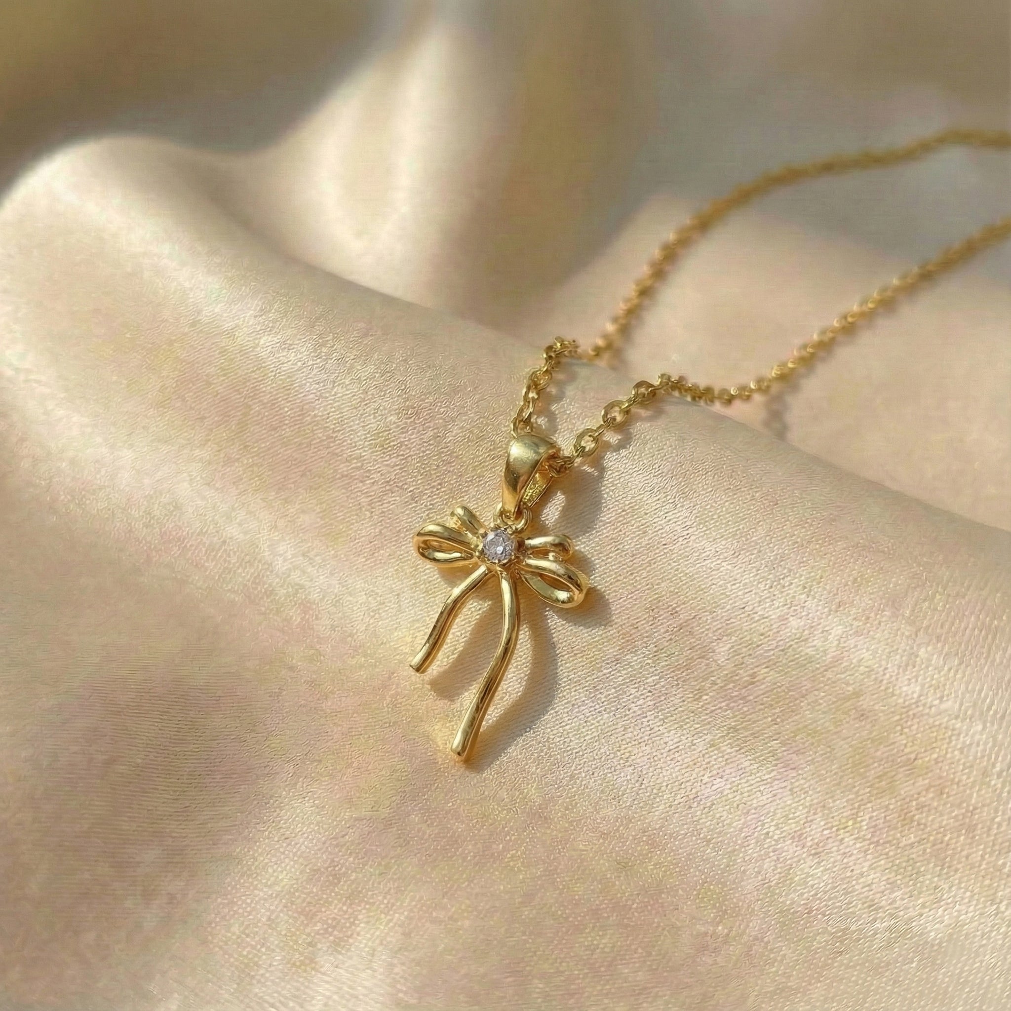 Dainty Polished Bowknot & Stone Pendant