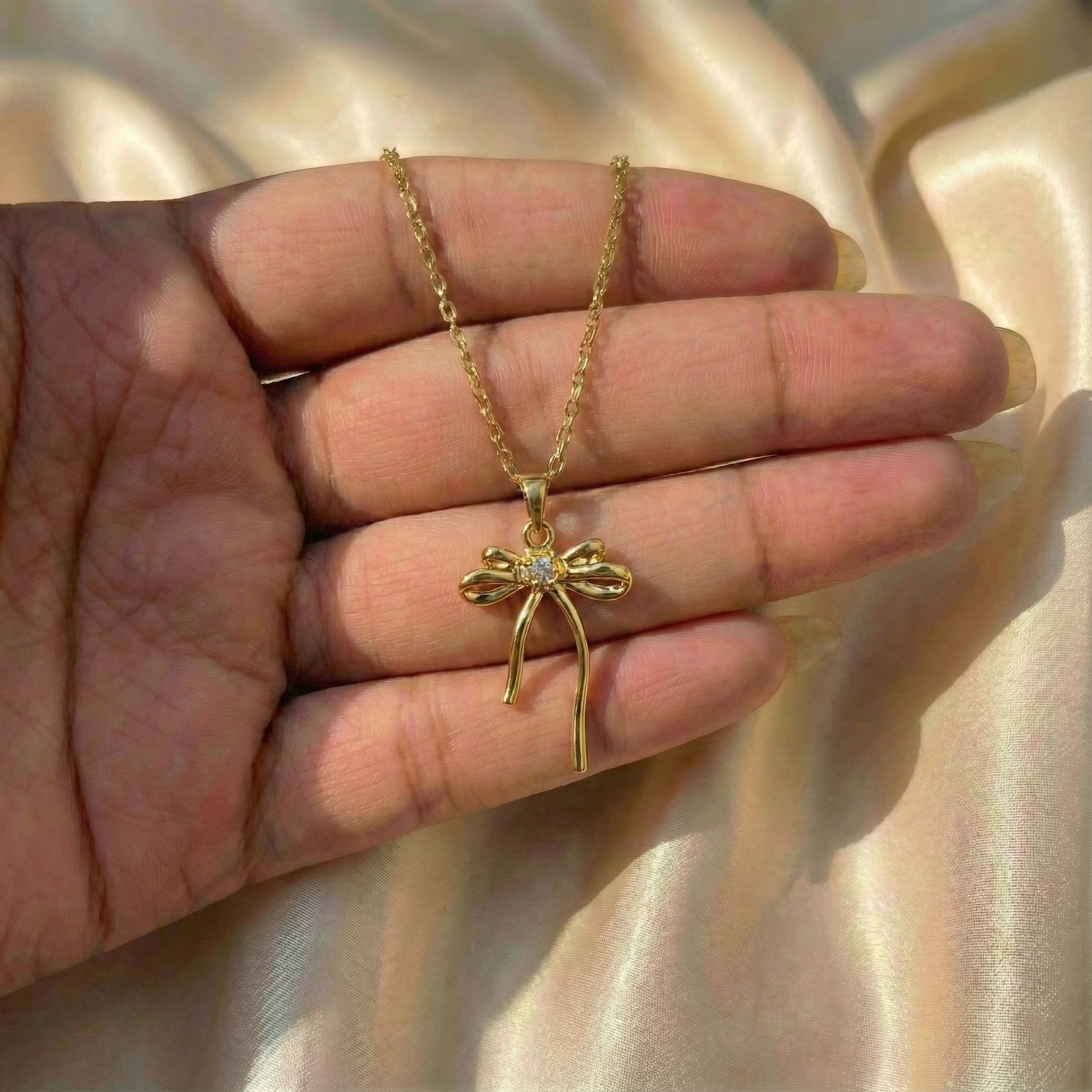 Dainty Polished Bowknot & Stone Pendant