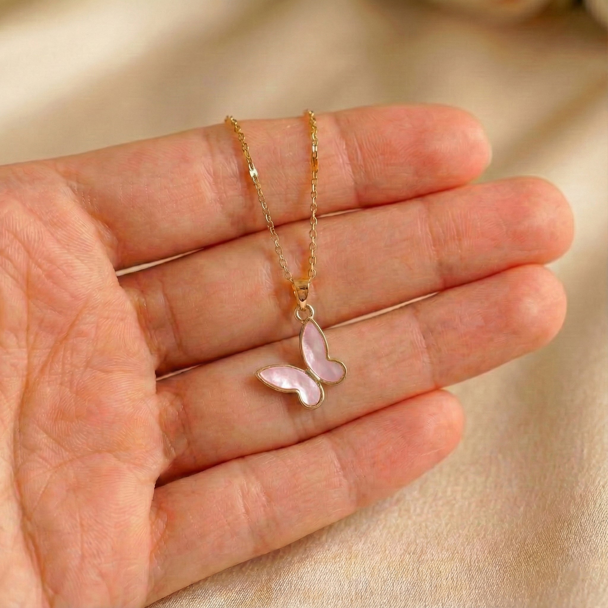 Rosewing Butterfly Charm