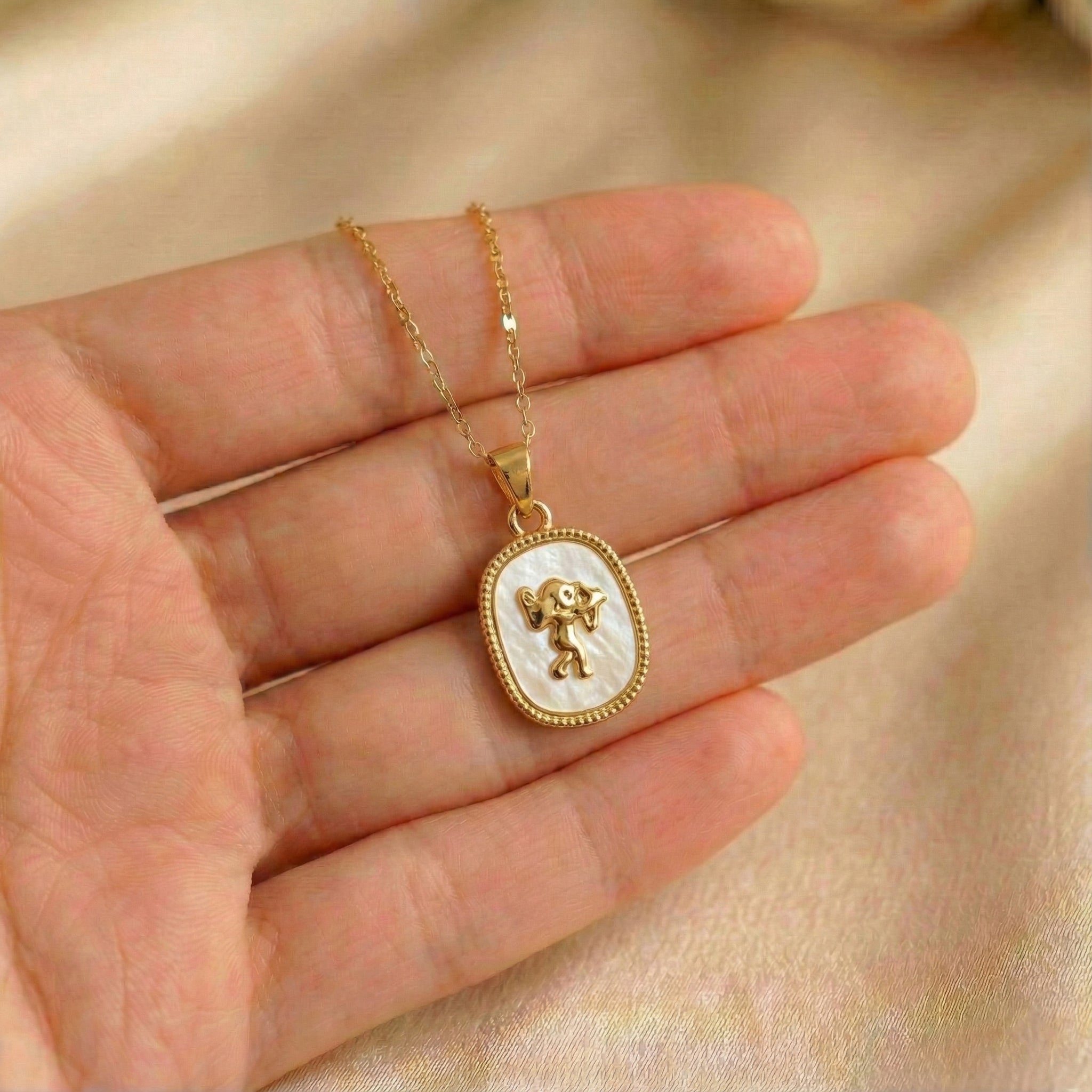 The Pearl Archer Charm